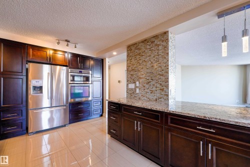 #1501 11710 100 Av Nw, Edmonton, AB - Indoor Photo Showing Kitchen With Stainless Steel Kitchen