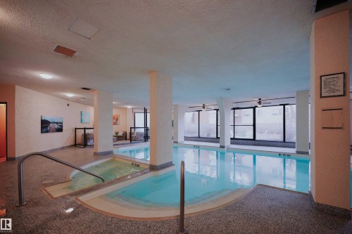 #1501 11710 100 Av Nw, Edmonton, AB - Indoor Photo Showing Other Room With In Ground Pool