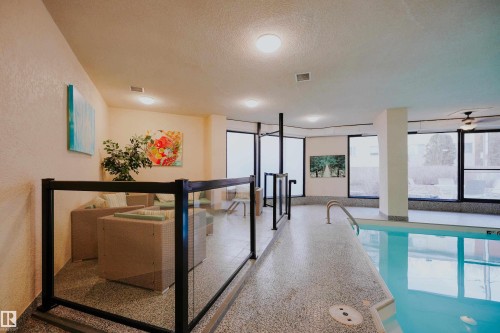 #1501 11710 100 Av Nw, Edmonton, AB - Indoor Photo Showing Other Room With In Ground Pool