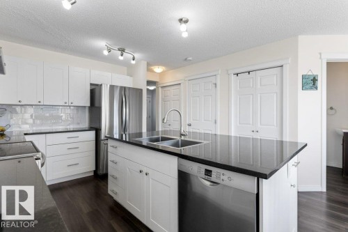 21247 91 Avenue Nw, Edmonton, AB - Indoor Photo Showing Kitchen With Double Sink With Upgraded Kitchen