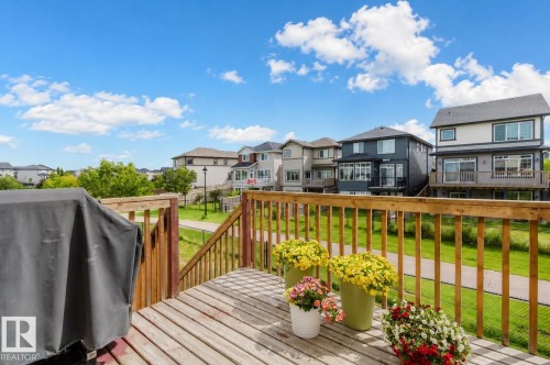 Wood-plank outdoor deck with natural wood railings - 3843 Agar Green Sw, Edmonton, AB - Outdoor With Deck Patio Veranda