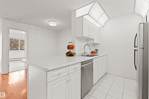 #307 911 Rabbit Hill Rd Nw, Edmonton, AB - Indoor Photo Showing Kitchen With Double Sink