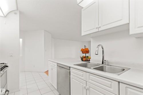#307 911 Rabbit Hill Rd Nw, Edmonton, AB - Indoor Photo Showing Kitchen With Double Sink
