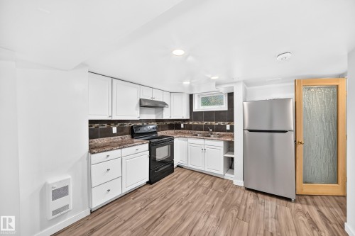 9240 85 Street Nw, Edmonton, AB - Indoor Photo Showing Kitchen With Double Sink