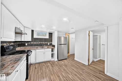9240 85 Street Nw, Edmonton, AB - Indoor Photo Showing Kitchen With Double Sink