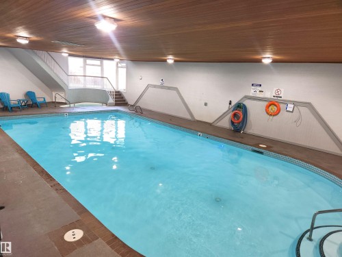 #224 5125 Riverbend Rd Nw, Edmonton, AB - Indoor Photo Showing Other Room With In Ground Pool