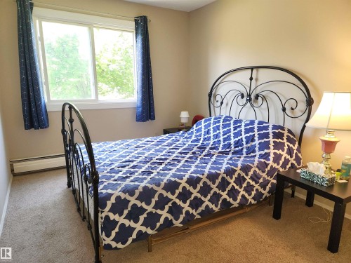 #224 5125 Riverbend Rd Nw, Edmonton, AB - Indoor Photo Showing Bedroom