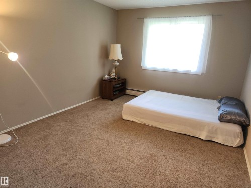 #224 5125 Riverbend Rd Nw, Edmonton, AB - Indoor Photo Showing Bedroom