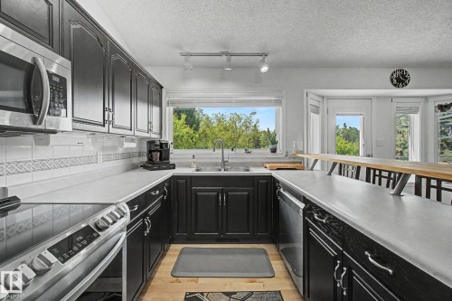32 Fairway Drive, Spruce Grove, AB - Indoor Photo Showing Kitchen With Double Sink