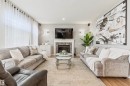 1235 Ormsby Lane Nw, Edmonton, AB  - Indoor Photo Showing Living Room With Fireplace 
