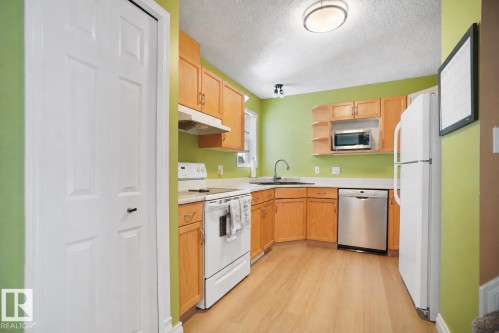 #46 3311 58 St Nw, Edmonton, AB - Indoor Photo Showing Kitchen