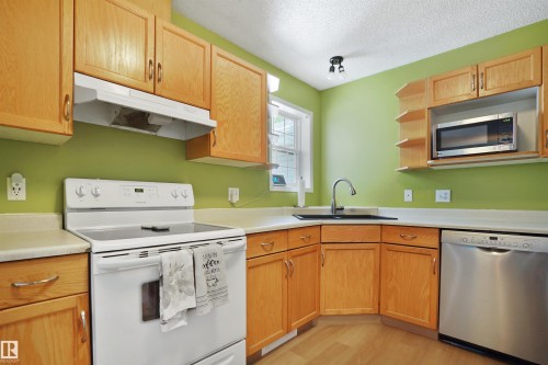 #46 3311 58 St Nw, Edmonton, AB - Indoor Photo Showing Kitchen