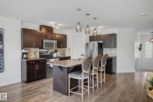 2083 Chalmers Way Sw, Edmonton, AB - Indoor Photo Showing Kitchen With Double Sink With Upgraded Kitchen