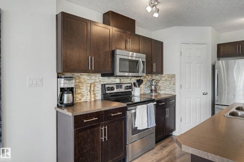 2083 Chalmers Way Sw, Edmonton, AB - Indoor Photo Showing Kitchen With Upgraded Kitchen