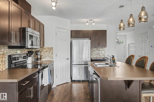 2083 Chalmers Way Sw, Edmonton, AB - Indoor Photo Showing Kitchen With Double Sink With Upgraded Kitchen