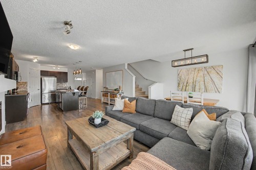 2083 Chalmers Way Sw, Edmonton, AB - Indoor Photo Showing Living Room