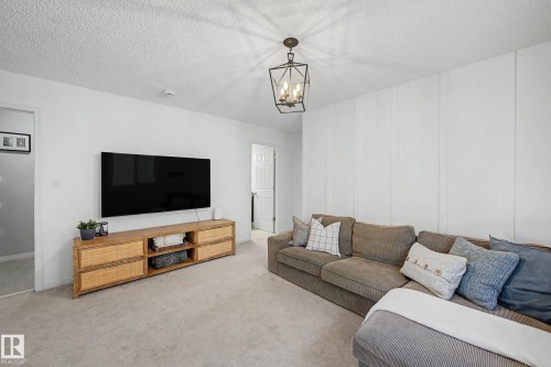 2083 Chalmers Way Sw, Edmonton, AB - Indoor Photo Showing Living Room