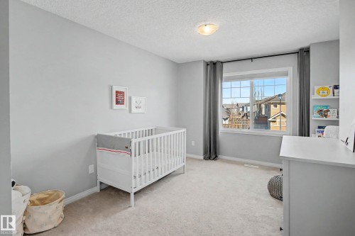 2083 Chalmers Way Sw, Edmonton, AB - Indoor Photo Showing Bedroom