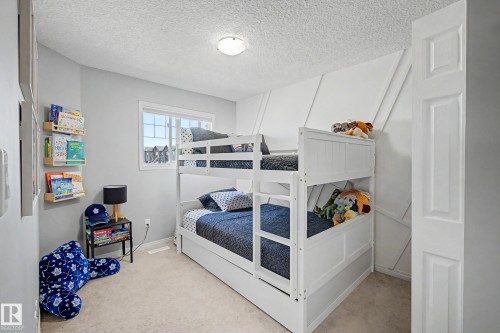 2083 Chalmers Way Sw, Edmonton, AB - Indoor Photo Showing Bedroom