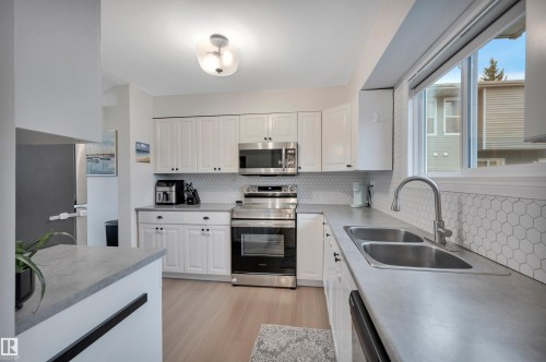 #35 4403 Riverbend Rd Nw, Edmonton, AB - Indoor Photo Showing Kitchen With Stainless Steel Kitchen With Double Sink