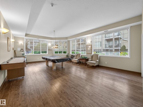 Spacious recreational room with pool table - #314 237 Youville Dr E Nw, Edmonton, AB - Indoor Photo Showing Other Room