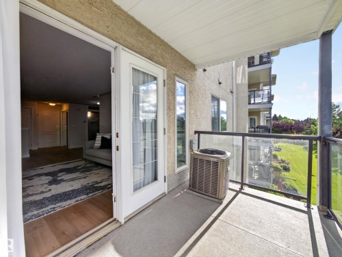 Private exterior balcony with French Doors - #314 237 Youville Dr E Nw, Edmonton, AB - Outdoor With Balcony With Exterior