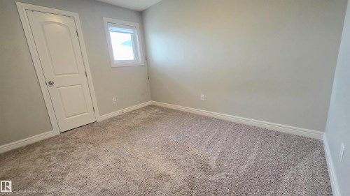 803 Secord Boulevard Nw, Edmonton, AB - Indoor Photo Showing Other Room