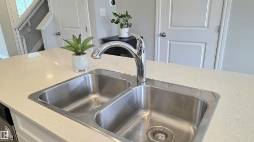 803 Secord Boulevard Nw, Edmonton, AB - Indoor Photo Showing Kitchen With Double Sink