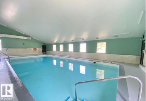 #31 11255 31 Av Nw, Edmonton, AB - Indoor Photo Showing Other Room With In Ground Pool