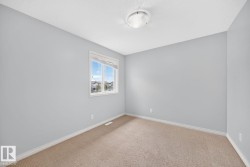 Neutral-toned carpeting paired with light grey walls - 