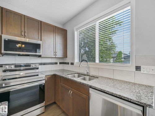 17629 60A Street Nw, Edmonton, AB - Indoor Photo Showing Kitchen With Double Sink
