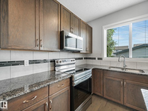 17629 60A Street Nw, Edmonton, AB - Indoor Photo Showing Kitchen With Double Sink