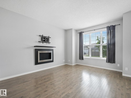 17629 60A Street Nw, Edmonton, AB - Indoor Photo Showing Living Room With Fireplace