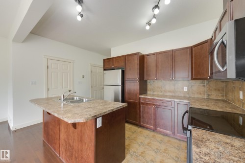 101 Sandstone Estates, Stony Plain, AB - Indoor Photo Showing Kitchen With Double Sink