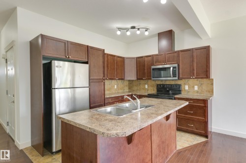 101 Sandstone Estates, Stony Plain, AB - Indoor Photo Showing Kitchen With Double Sink