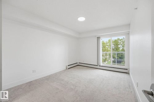 #416 9504 182 St Nw, Edmonton, AB - Indoor Photo Showing Other Room