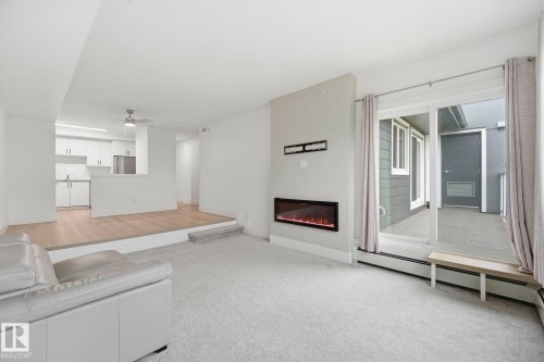 #416 9504 182 St Nw, Edmonton, AB - Indoor Photo Showing Other Room With Fireplace