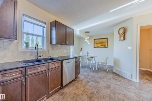 #405 178 Bridgeport Bv, Leduc, AB - Indoor Photo Showing Kitchen With Double Sink