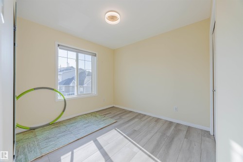#405 178 Bridgeport Bv, Leduc, AB - Indoor Photo Showing Other Room