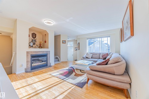 #405 178 Bridgeport Bv, Leduc, AB - Indoor With Fireplace