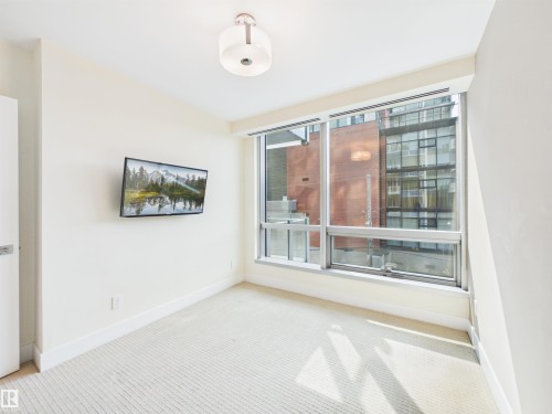 #307 11969 Jasper Av Nw, Edmonton, AB - Indoor Photo Showing Other Room