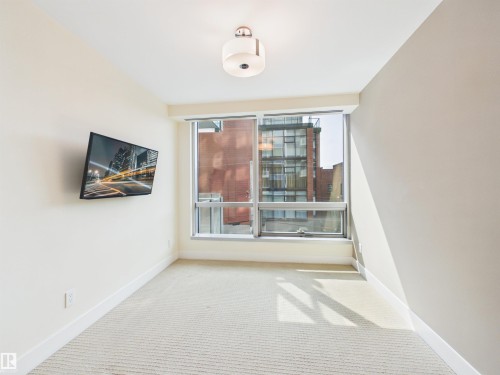 #307 11969 Jasper Av Nw, Edmonton, AB - Indoor Photo Showing Other Room