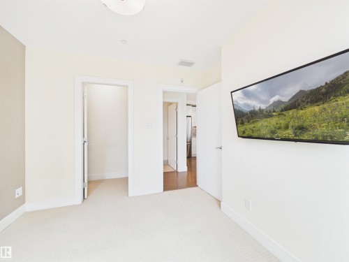 #307 11969 Jasper Av Nw, Edmonton, AB - Indoor Photo Showing Other Room