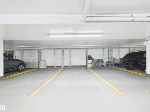 #307 11969 Jasper Av Nw, Edmonton, AB - Indoor Photo Showing Garage