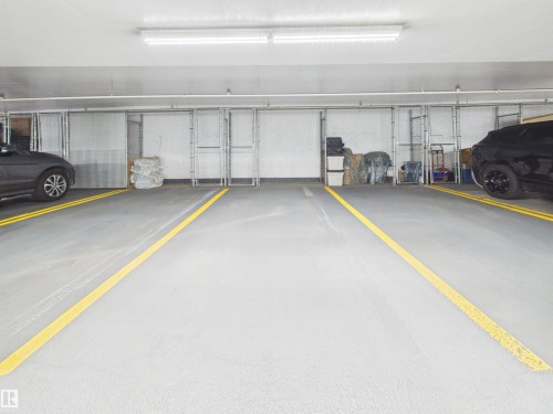 #307 11969 Jasper Av Nw, Edmonton, AB - Indoor Photo Showing Garage