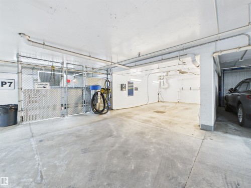 #307 11969 Jasper Av Nw, Edmonton, AB - Indoor Photo Showing Garage