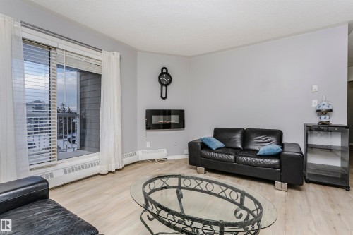 #302 5005 31 Av Nw, Edmonton, AB - Indoor Photo Showing Living Room