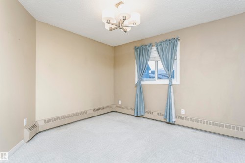 #302 5005 31 Av Nw, Edmonton, AB - Indoor Photo Showing Other Room