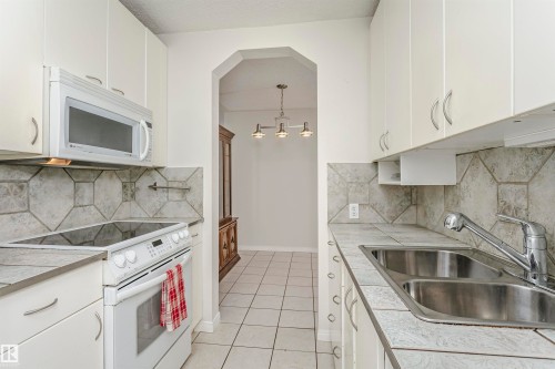 #302 5005 31 Av Nw, Edmonton, AB - Indoor Photo Showing Kitchen With Double Sink