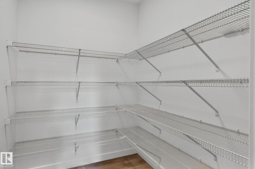 Ample wire shelving system providing extensive storage capacity - 23027 96 Avenue Nw, Edmonton, AB - Indoor With Storage